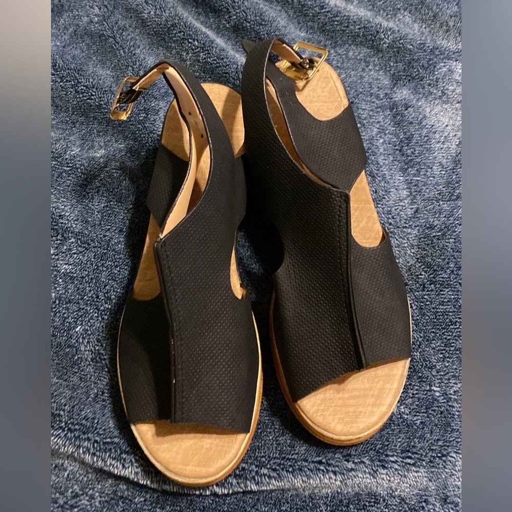 Black wedges, women’s size 9.